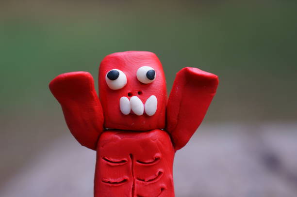 istock A close-up figure of a red zombie. 1465753098