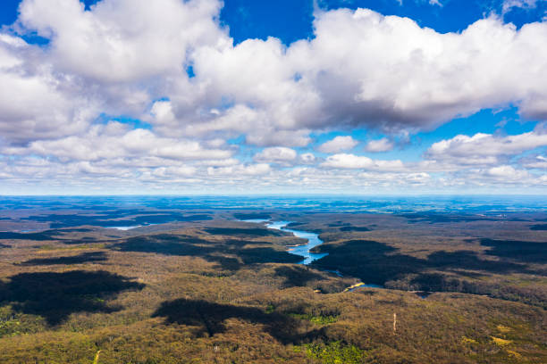 istock Clouds over vast mountain landscape with lakes and rivers 1465754168
