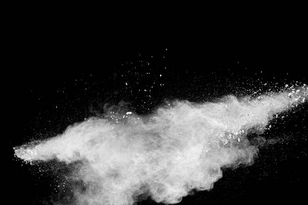 istock White powder explosion cloud against black background.White dust particle splash. 1465755917