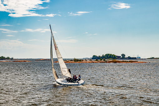 Helsinki, Finland - 12 June 2022: Yacht near Helsinki shore.