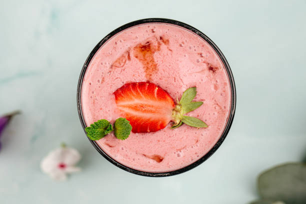 istock Glass of strawberry smoothie cocktail 1465760899