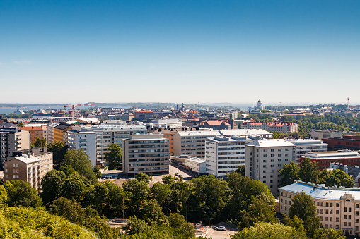 Aerial view of Helsinki center from amusement park Linnanmaki at sunny summer day.