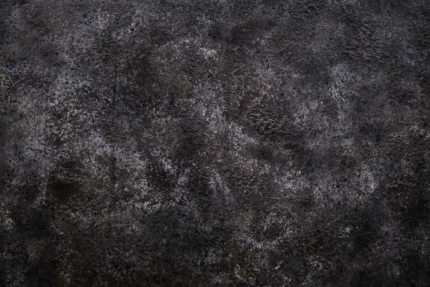 istock Beautiful abstract texture background made of dark concrete with gray spots. 1465766318