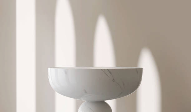 istock White marble stone round, bowl shape podium with arch sunlight, shadow from window on beige wall 1465768513