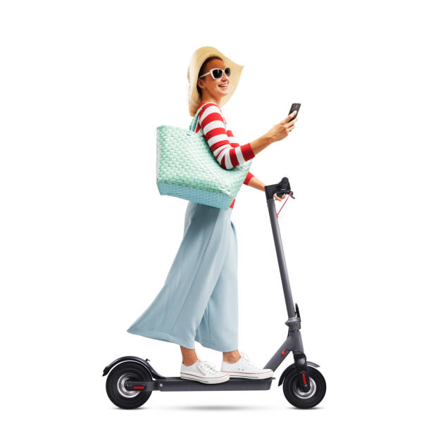 istock Woman using her smartphone and riding an e-scooter 1465773882