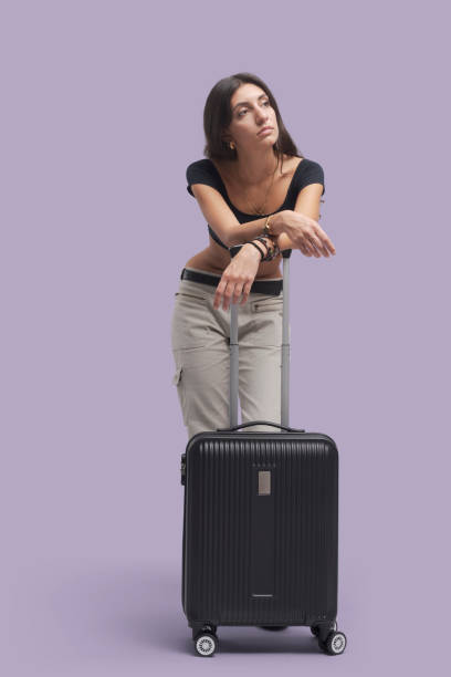 istock Tired traveler woman waiting alone 1465783591