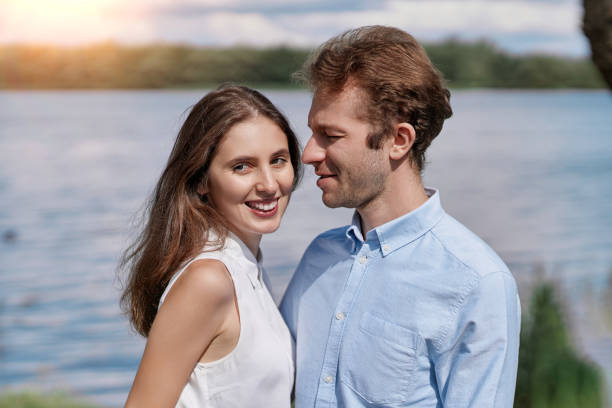 istock young couple kisses during a country walk . 1465796861