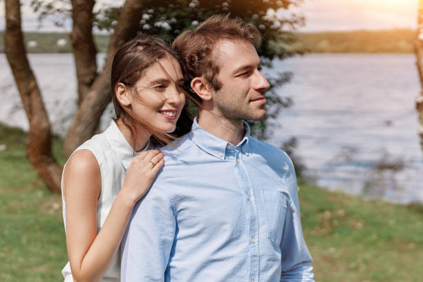 istock young couple during a country walk . close-up. 1465797718