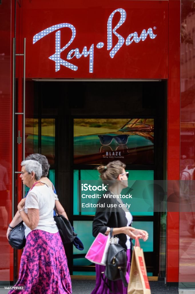 Shoppers Pass By A Ray Ban Store On A High Street In London Stock Photo -  Download Image Now - iStock