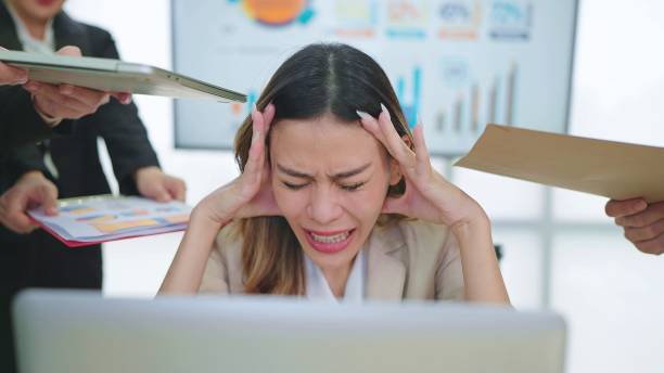 istock Young asian businesswoman working feels furious stressed, having problems at work and angry upset 1465800493