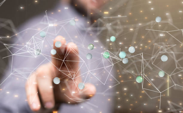 istock Male's hand pointing to illustrated digital network and data concept 1465801224