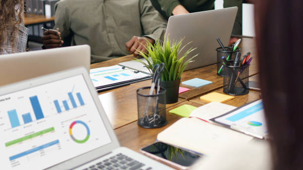 istock business team working on a financial report. close-up. 1465805947