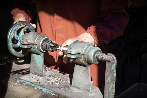 istock Closeup shot of a professional adjusting a drill 1465809153
