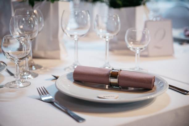 istock Table interior with white dishes and glasses 1465809597