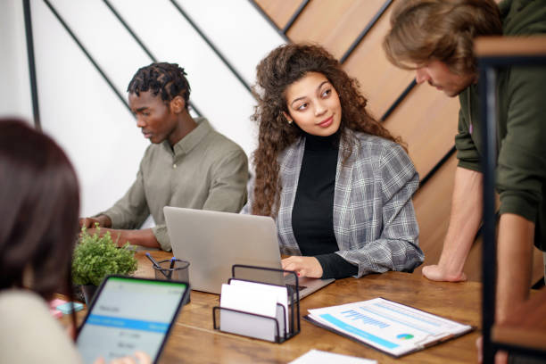 istock business team working in a modern office. 1465809661