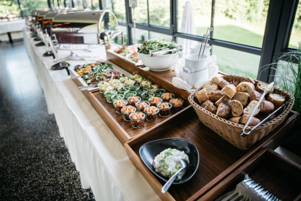 istock Table filled with salads desserts and bread indoors 1465809692