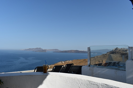 A beautiful view of the Aegean sea surrounded by mountains in Greece