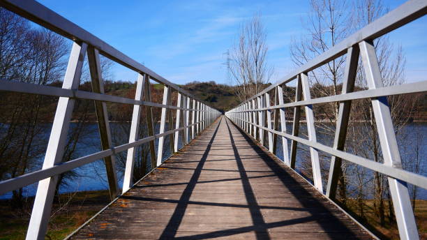 istock Bridge over the river against a blue sky on a sunny day 1465815791