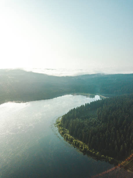istock A blue lake at sunrise from above. 1465815826