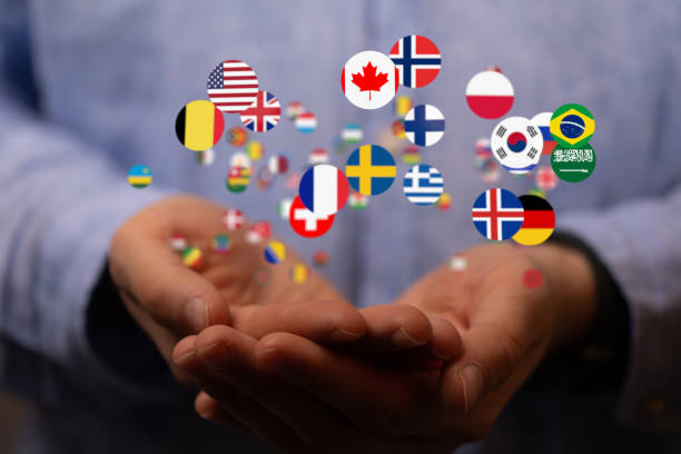 istock 3D rendering of two hands holding international country flags 1465816615