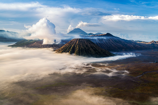 Morning view of Mount Bromo surrounded with a sea of clouds, East Java, Indonesia