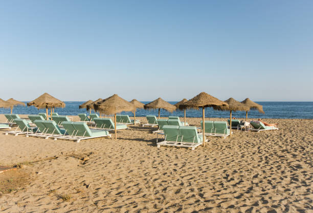 istock Beach chairs and umbrellas in Costa del Sol, Spain 1465816709