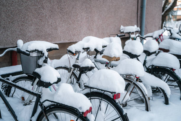 istock Bicycles on a rack covered with snow in Helsinki, Finland 1465826717