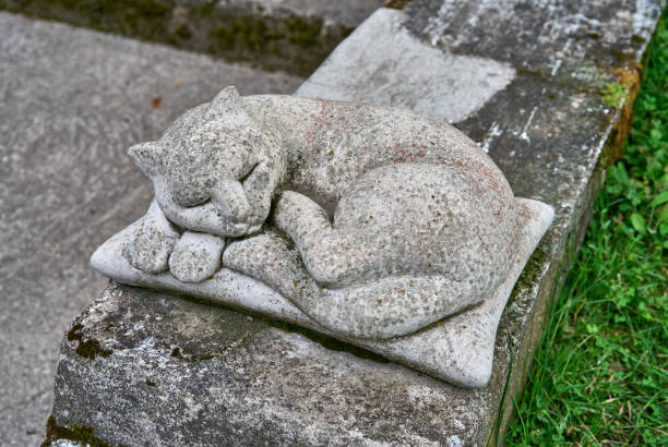istock A cat made of stone sleeping 1465826962