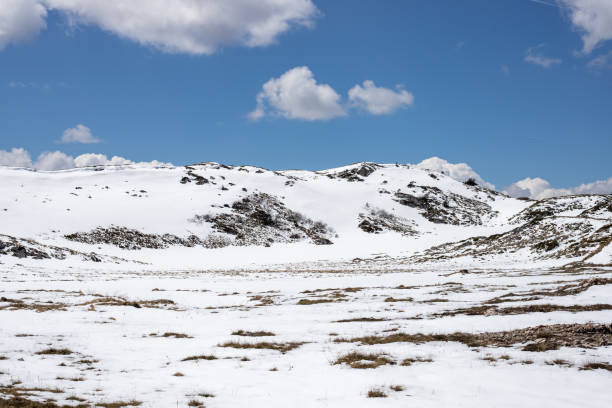 istock Landscape view of mountains covered in snow 1465826982