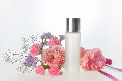 Skin Lotion and Cream with Flowers/Studio Shot