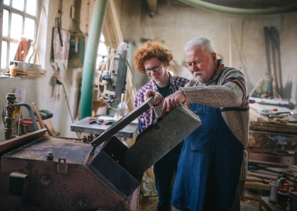 istock Putting a log into a wood burning stove 1465828752