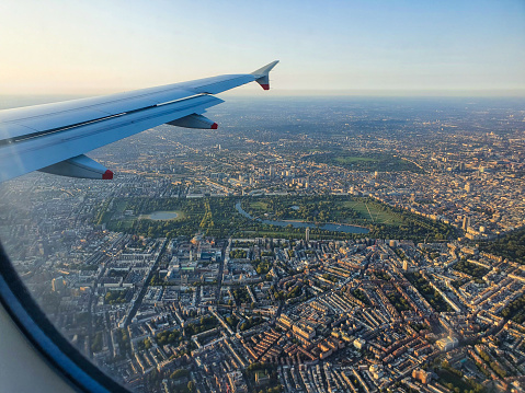 An aerial photo from an airliner window showing the huge scale of Hyde Park in London, regents park can also be seen in the distance