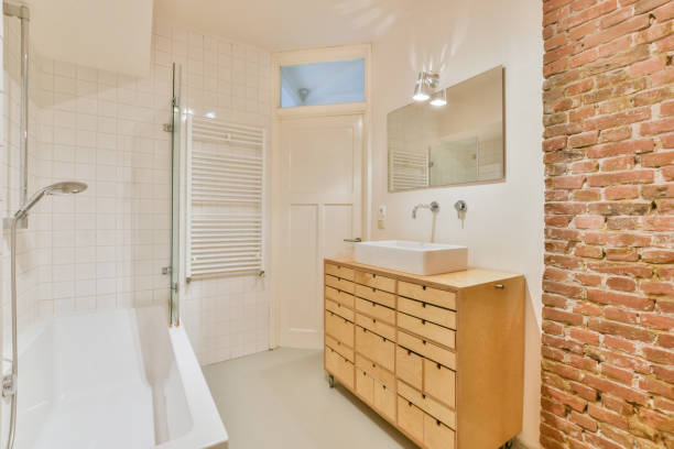 istock Beautiful renovated empty bathroom interior with a modern design 1465831603
