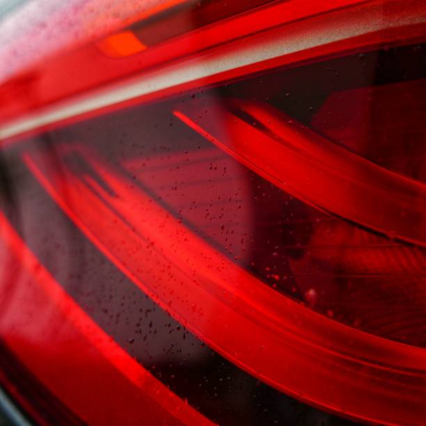 istock Misty car's re light glass on background 1465832074