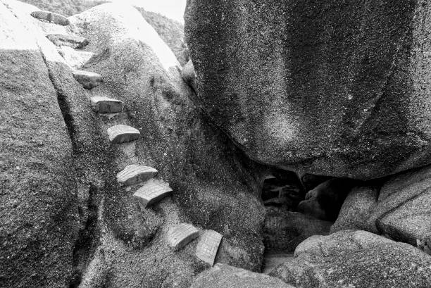 istock Grayscale of huge rock cave 1465832391