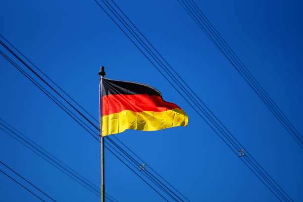 istock German flag in front of high-voltage power lines. 1465832574