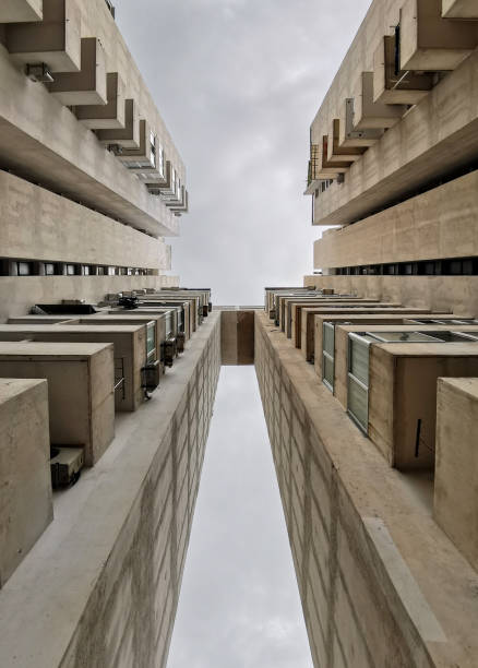 istock Directly below image of tall concrete residential building. 1465833578