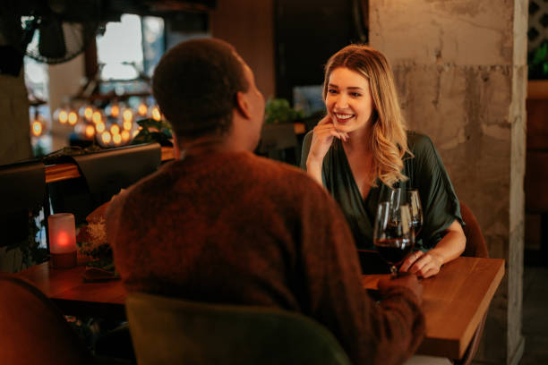 istock Cheerful couple on romantic date. 1465835997