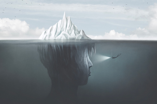 illustration of scuba diver with torch illuminating the dark side of the iceberg underwater, surreal mind concept