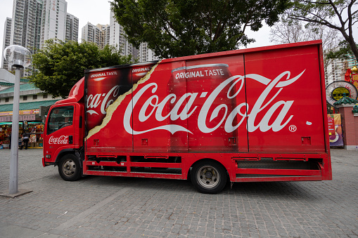 Hong Kong - February 14, 2023 : General view of the Coca-Cola Delivery Truck in Kowloon, Hong Kong.