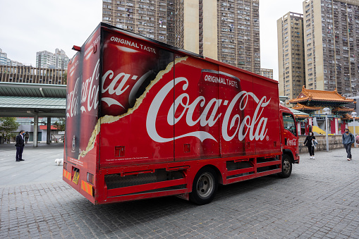 Hong Kong - February 14, 2023 : General view of the Coca-Cola Delivery Truck in Kowloon, Hong Kong.