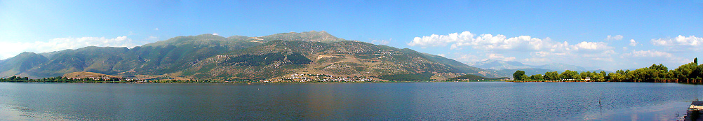 Panoramic view of Lake Iaonnina (Lake Pamvotida or Lake Pamvotis). Located in the North of Greece, it is the largest lake in Epirus and it is home to small fishing ports and a marina.