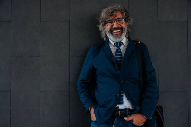 istock Smiling mature businessman. 1465846586