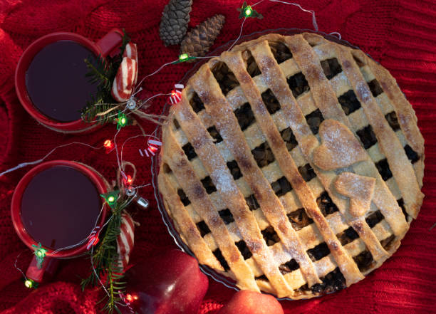 istock Apple pie and hot tea for picnic guests on sunny day 1465853694