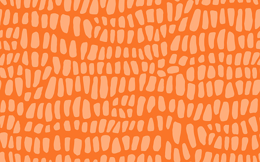 Abstract modern crocodile leather seamless pattern. Animals trendy background. Orange decorative vector illustration for print, fabric, textile. Modern ornament of stylized alligator skin.