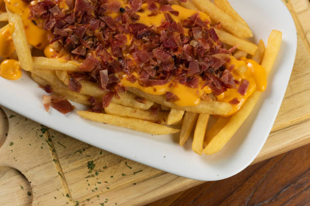 istock delicious fries with cheddar cheese and bacon 1465879154