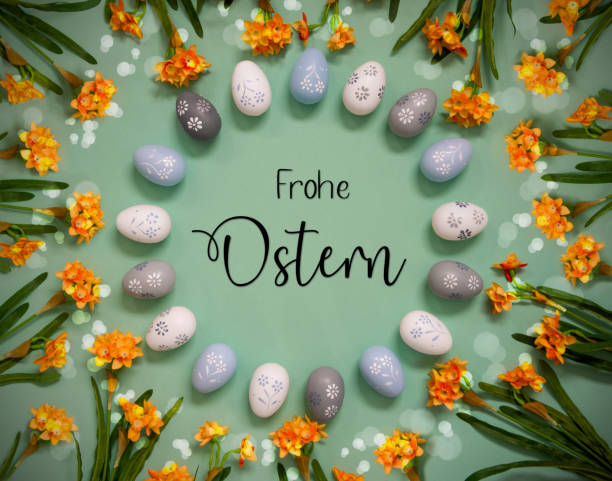 easter egg decoration, spring flowers, text frohe ostern means happy easter - ostern stok fotoğraflar ve resimler