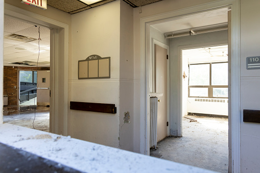 An abandoned Tuberculosis Asylum lies vacant awaiting demolition in the Midwest.