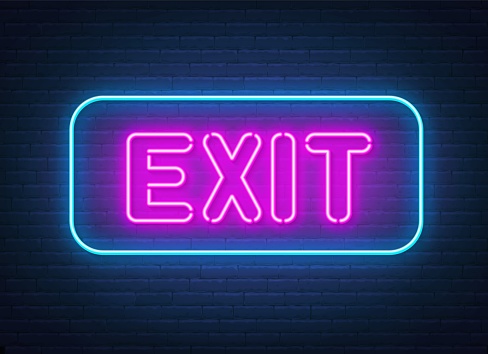 Exit neon sign on brick wall background .