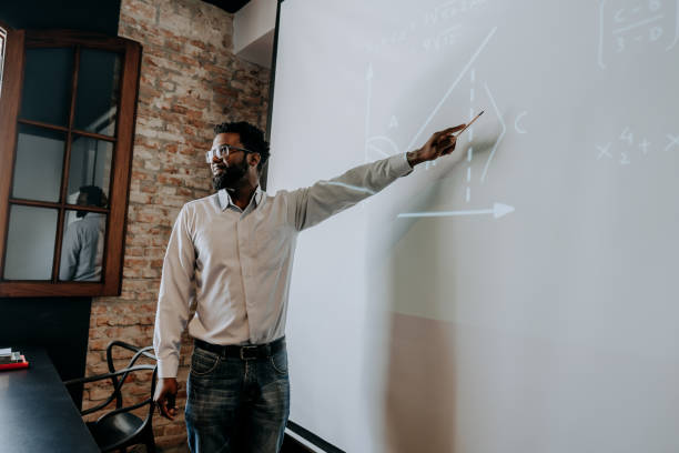 istock Portrait of a teacher teaching math 1465888758